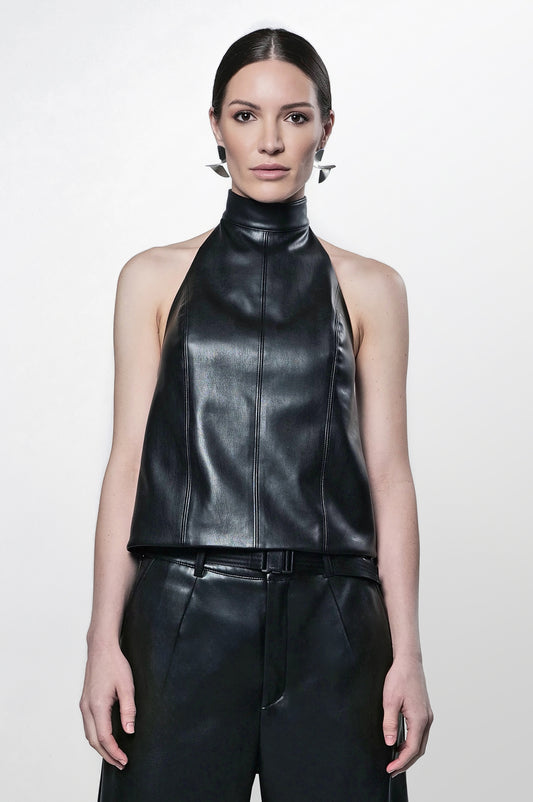 Model wearing black vegan leather halter top