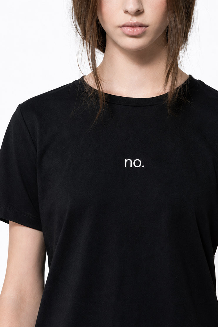 Close up image of a black t-shirt with a graphic that says "no."
