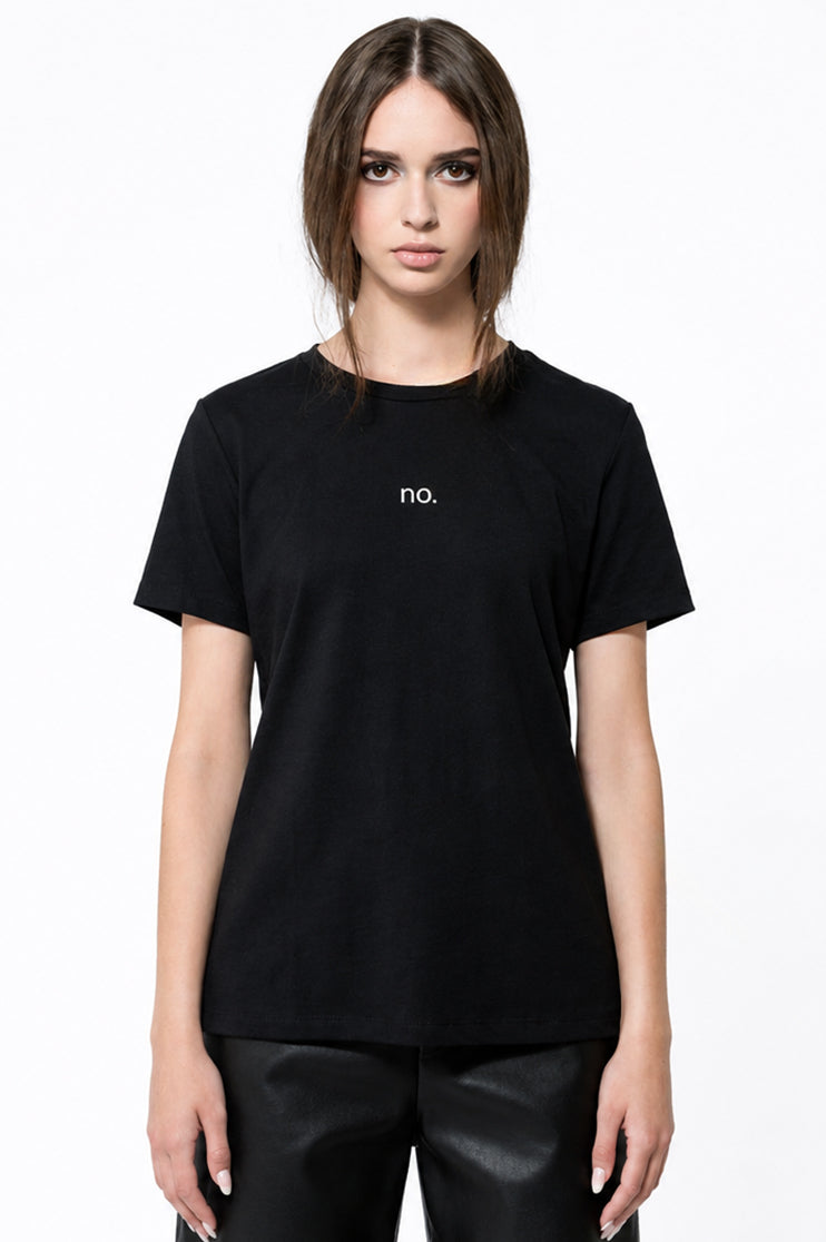 Woman wearing a black t-shirt that says "no." in white